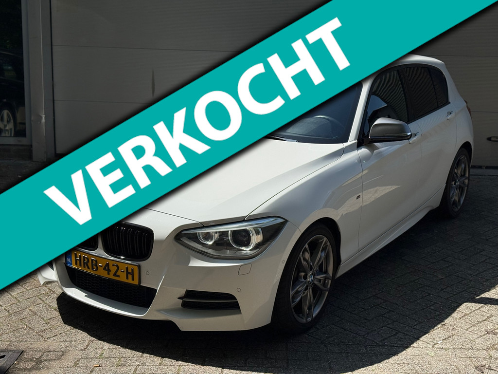 BMW 1 Serie M135i xDrive High Executive l Schuifdak l Volleder l Groot Navi l Bi-Xenon l 49482439-0.jpg | Zwaard Auto's
